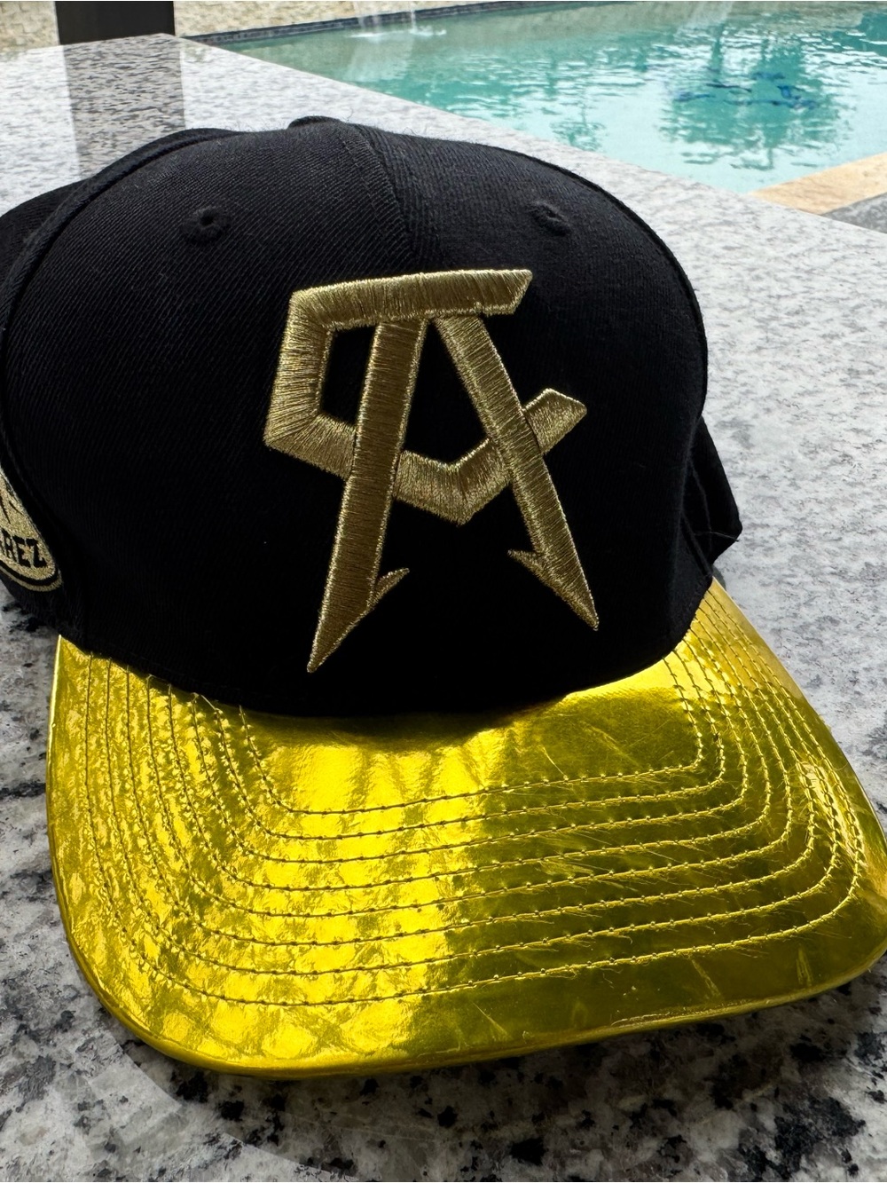 Canelo Álvarez Black & Gold Embroidered Snapback Hat with Metallic Gold Brim